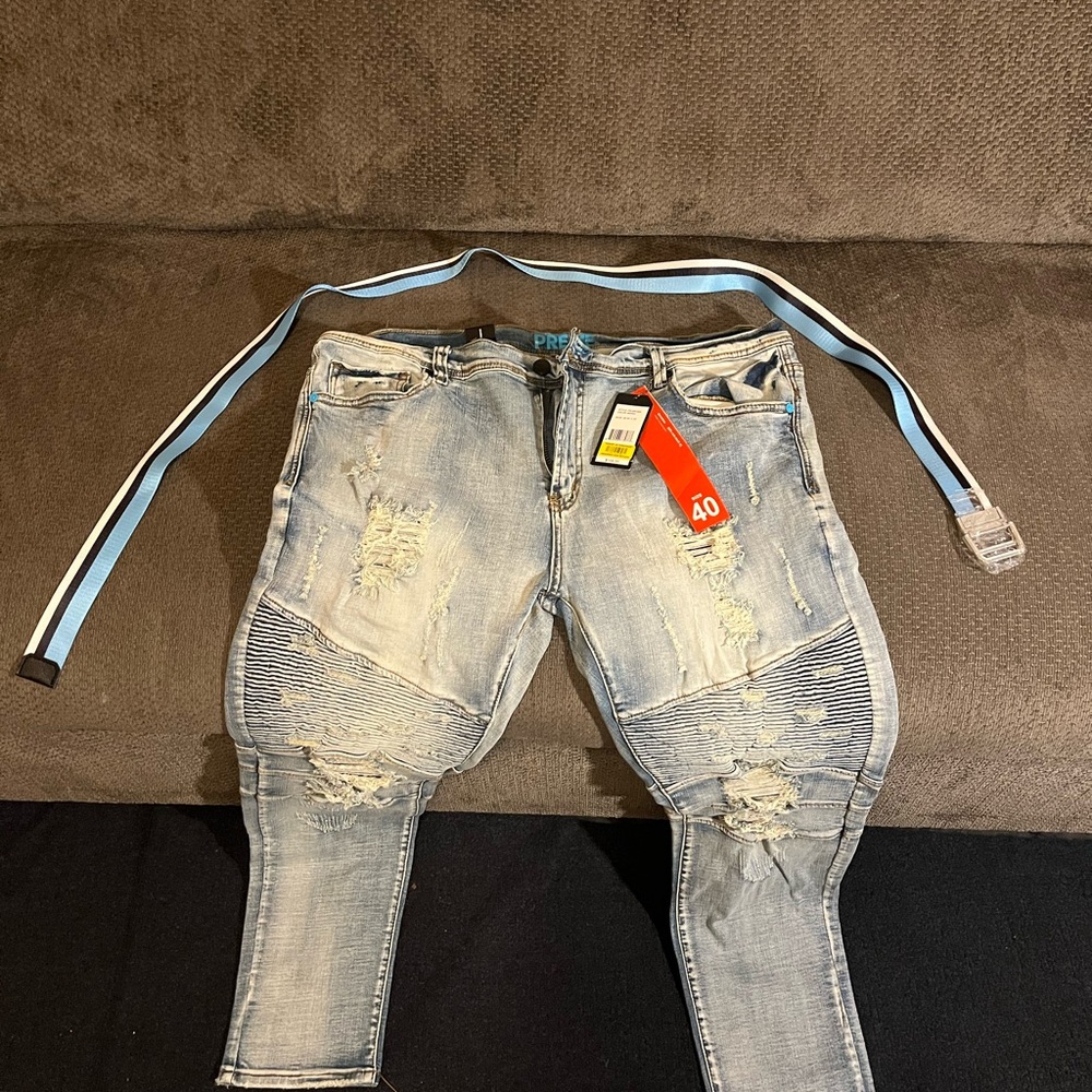 Light Blue Distressed Jeans with Belt